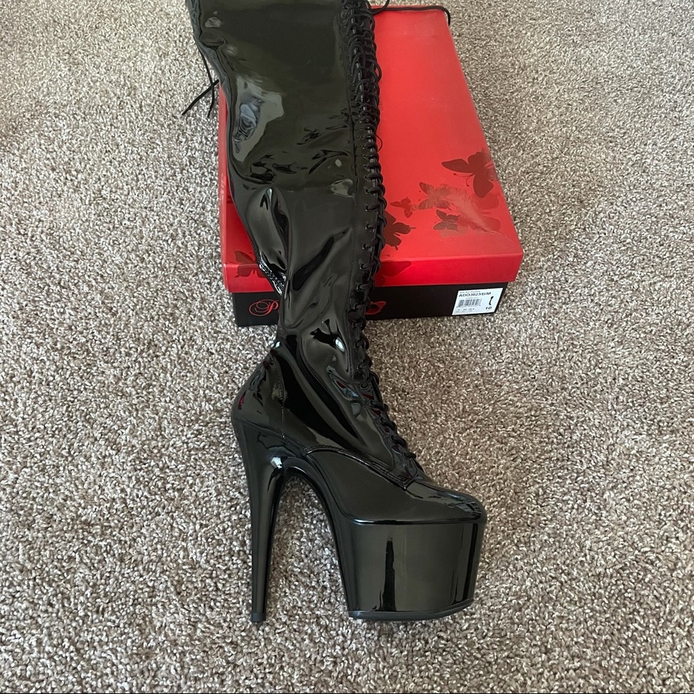 Thigh High Lace Up Platform Boots. Women’s size 10. Seven inch heel. Never worn.